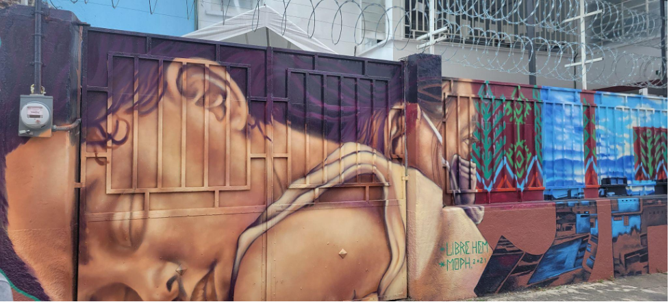 “Listen to us, don't judge us,” says one of the murals painted by migrants in Albergue Tochán, a shelter in Mexico City.