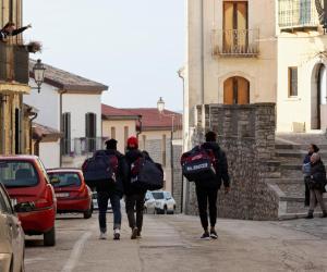 Migrants in Bisaccia’s SPRAR return home from a soccer match