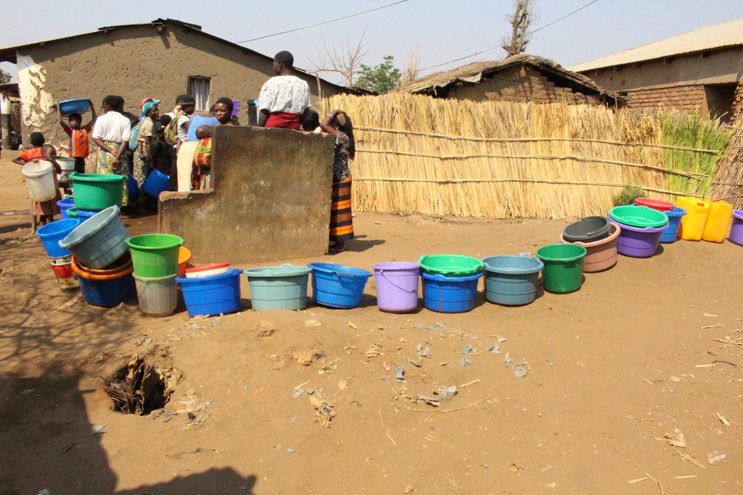 Women and girls waiting in a queue for water in Lilongwe, Malawi. Photo from Ellis Adjei Adams.